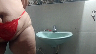 Hot MILF masturbates in the boss's bathroom with her dildo and moans with pleasure