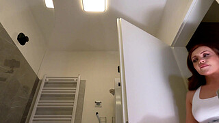 Hottest redhead real MILF wife with the shortest skirt and tan color fishnet stockings in the bathroom