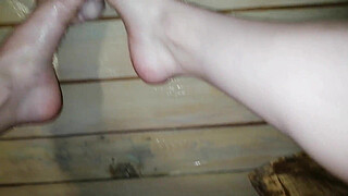 Stepmom Demonstrates how she can jerk off a dick with her feet, and then she shows how deep dildo in her deep throat. Foot fetish homemade.