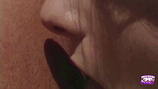 A saucy redhead gets her pussy eaten by the pool and gives a footjob