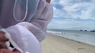 A stranger milf gives me a handjob in front of everyone.