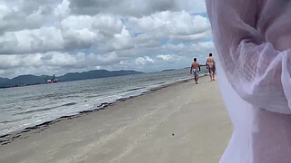 A stranger milf gives me a handjob in front of everyone.