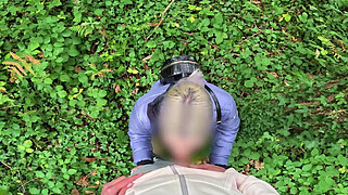 I see a girl cycling in the woods and when I go to urinate she helps me by giving me a blowjob in public