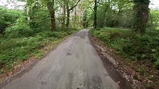 I see a girl cycling in the woods and when I go to urinate she helps me by giving me a blowjob in public