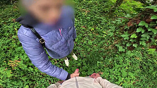 I see a girl cycling in the woods and when I go to urinate she helps me by giving me a blowjob in public