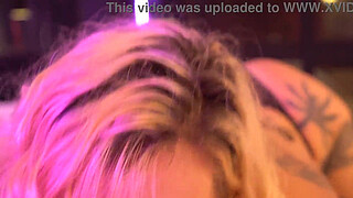 Busty blonde gives a blowjob and handjob backstage