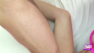 A horny blonde guy sucks on brunette MILFs huge tits and sits on her face