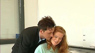 Redhead beauty fucked in the office by the always horny boss