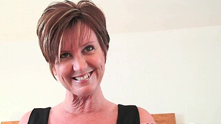 Classy grandma with big tits wears black stocking