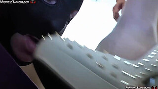 Barefoot Mistress Tangent has slave by the balls