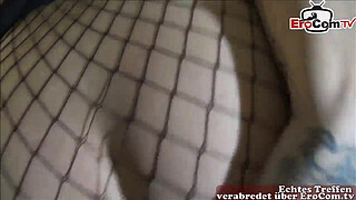 German amateur teen slut fucks with black cock on table with fishnet stockings