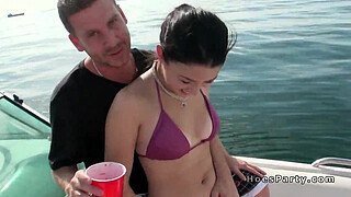 Sexy babes in bikinis partying on a boat