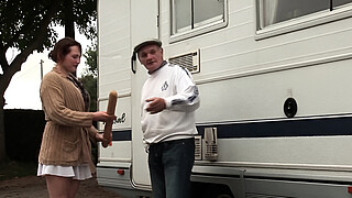 Serious redhead whore double penetrated in a gangbang with an old man