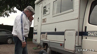 Serious redhead whore double penetrated in a gangbang with an old man