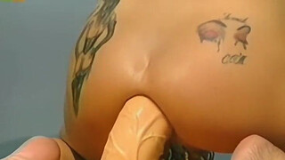 O'Pearl by the pool with a BIG dildo in her ass.