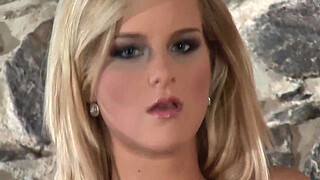 Hot blonde in stockings panties and stilettoes