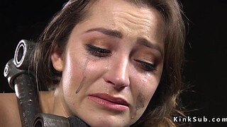 Slave in metal device bondage vibrated