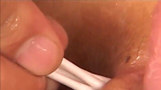 Big dildo stretches wide to take on a super huge pink dildo