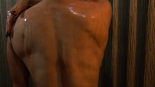 Bodybuilder With Huge Fake Tits Oils Up