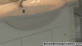 Brunette chick clamp tits and fucked by huge vibrator in BDSM style