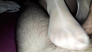 Amateur footjob white stockings with cum