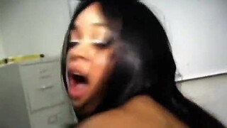 Horny black babe takes on a big cock