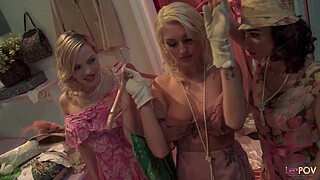 Dressing up makes the lesbians aroused as they start a threesome filled with sex toys and wet twats