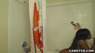 Ebony girl showers her big ass & masturbating