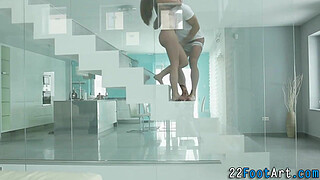 Babe tugs cock with feet