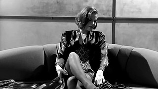 Bobbi S masturbates in a corset and stockings