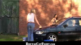 Rough catfight at a carwash