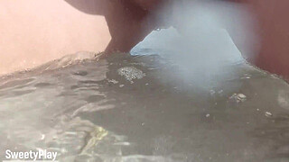 Shaved pussy peeing on public beach