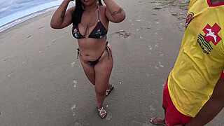 Naughty Nicoly seduces a fireman on the beach and sits on his dick in the middle of the woods