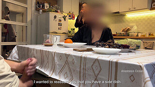 My husband jerking under a table front of my step mom and i right at the kitchen.