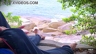 Surprise ejaculation handjob on the beach