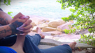 Surprise ejaculation handjob on the beach