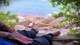 Surprise ejaculation handjob on the beach