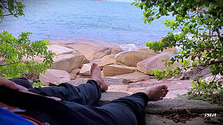 Surprise ejaculation handjob on the beach