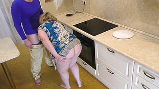 The ass of a mature MILF lay well in her hand and impaled on her penis