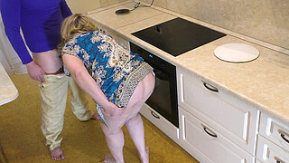 The ass of a mature MILF lay well in her hand and impaled on her penis