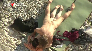 Beach Voyeur. Is fresh sperm good as a sunblock cream?