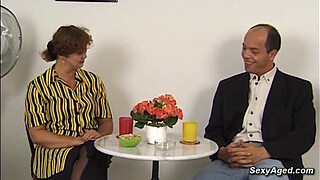 Busty amateur German mature lady Beatta jerking big cock to balding guy Gustavo Meunier while he toying her hairy pussy then he fucks her