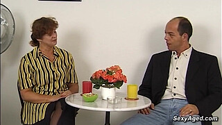 Busty amateur German mature lady Beatta jerking big cock to balding guy Gustavo Meunier while he toying her hairy pussy then he fucks her