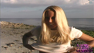 Hot Blonde Bares Her Pierced Pussy At A Public Beach