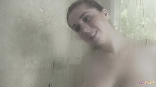 Showering together makes the chunky lesbian excited so she plays with her blonde friend by licking her twat