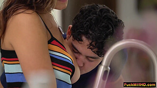 Naughty boyfriend started sucking my tits while I was washing dishes, when his stepmom caught us, but the slut just wants some fun, in the end we ended up having threesome sex in the living room