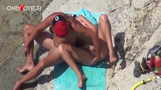 Beach Voyeur. Super horny teen getting off right on the nude beach