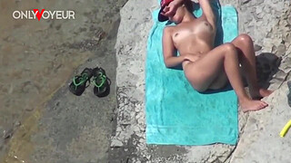 Beach Voyeur. Super horny teen getting off right on the nude beach