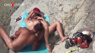 Beach Voyeur. Super horny teen getting off right on the nude beach