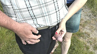 Random man pees. My slut wife saw random man on street who wanted to pee. Wife came up to him, unzipped pants and held his peeing dick in fingers. Naked men dressed women. Public. Outdoor. Outside. MILF. Beauty. Short skirt. Handjob. Fingering. In public